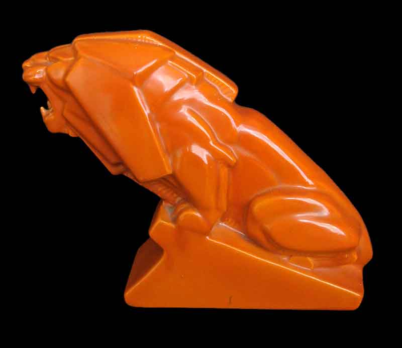 Percy Metcalfe Lion of Industry in orange.